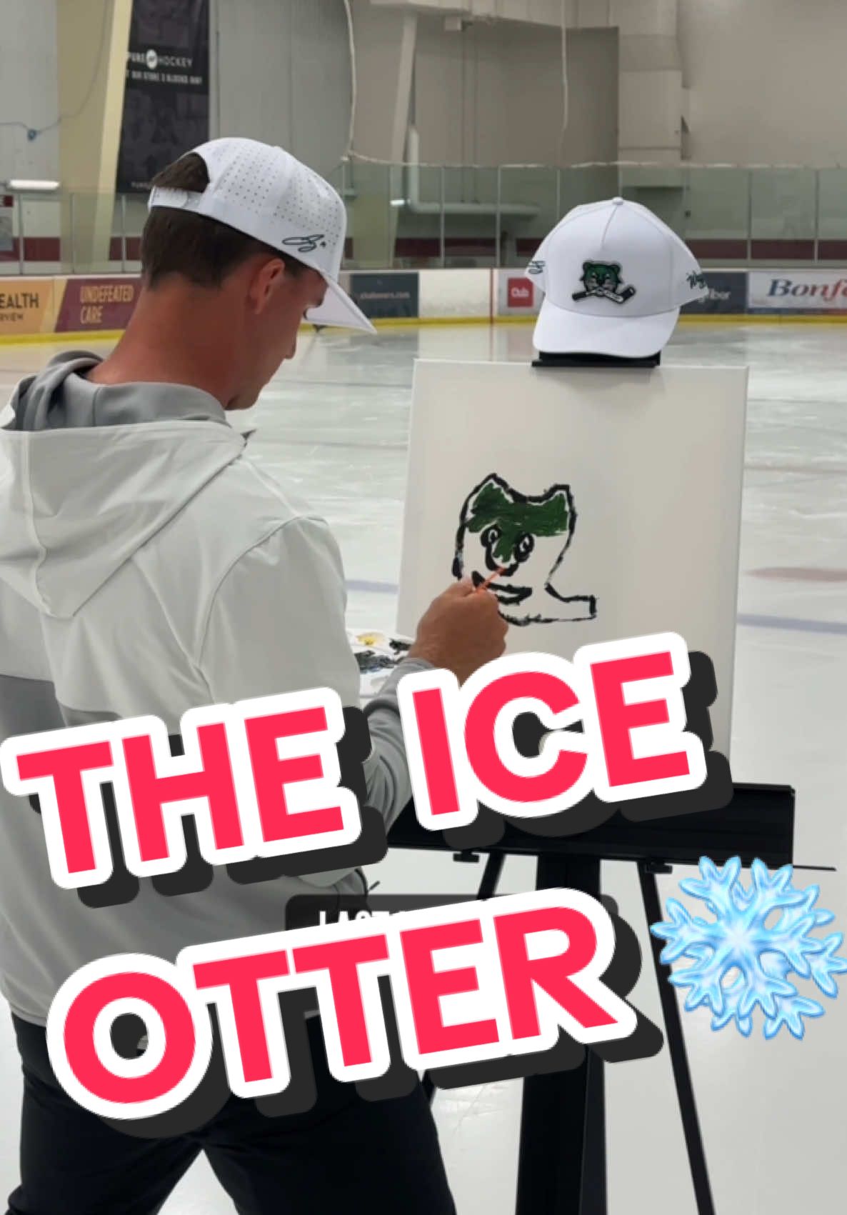 Otter paints an otter 🦦 Jake Oettinger’s limited-edition Ice Otter hat is available now while supplies last #getyourwaggleon #jakeoettinger 