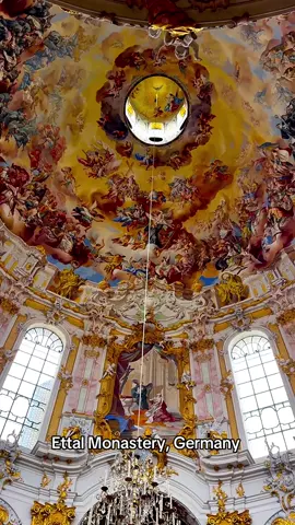 Ettal Monastery (Kloster Ettal) is one of the most magnificent monasteries in Bavaria, founded in 1330 by Emperor Ludwig IV of Bavaria. According to legend, it was built on the spot where a small statue of the Virgin Mary, brought by the emperor from Rome, miraculously fell to the ground. The main church, dedicated to the Assumption of the Virgin Mary, impresses with its late Baroque dome and stunning frescoes by Joseph Schmutzer. Today, the Benedictine monks of Ettal are known not only for their spiritual devotion but also for producing liqueurs, beer, and cheese using traditional recipes. Ettal is a place where history, faith, and the beauty of the Alps unite in perfect harmony. #klosterettal #baroque #church #historicsites #culturalheritage 