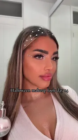 Walk like an angel…. With a twist ✨ Day 17 Halloween makeup look.  @HELIA BEAUTY LTD  Contact lenses  Lashes  @SHEGLAM  White crayon pencil  Glitter for body  @eBay UK  Gem stones  @Huda Beauty  Lip liner shade pinky brown  #halloween #walklikeanangel #devil #angelmakeup #devilmakeup 