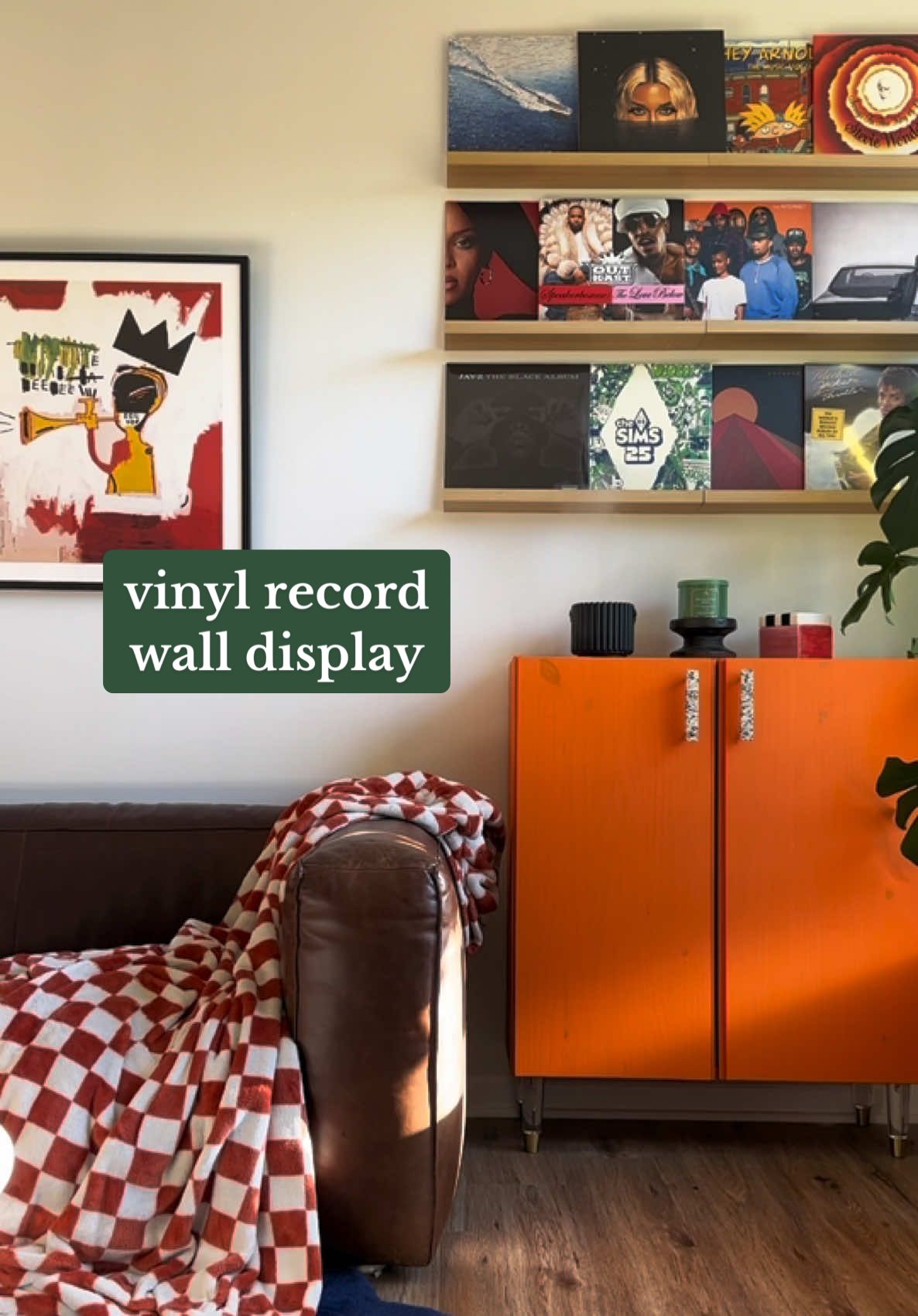 I used the @IKEA USA MOSSLANDA shelves for the vinyl wall. They have longer shelves but I already had short ones so I just chose to double it.. I'm obsessed! 😍 #colorfuldecor #colorfulhome #blackart #vinylcollection #apartmentdecor 