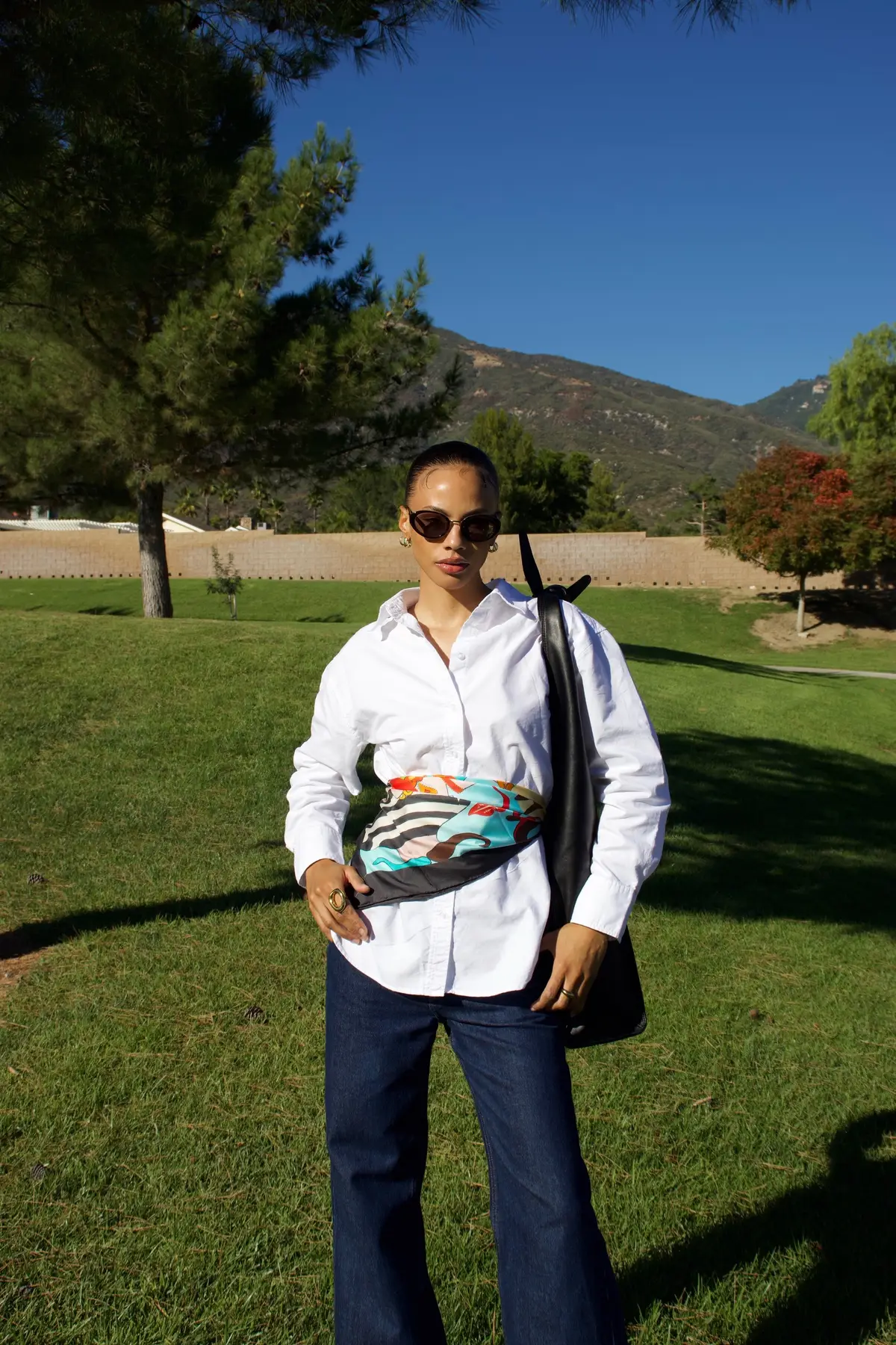 Wearing the La Madrina scarf by @labottegadilayla, a silk collaboration with Italian artist Mieke Govaerts.