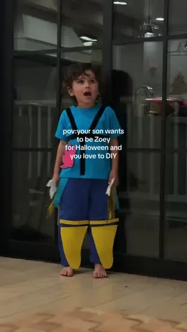 When your son wants nothing more than to be Zoey from Kpop Demon Hunters and the internet has nothing to offer him! So you take matters into your own hands and just make one just for him! 😈 BTW: ribbons / patches aren't even sewn down yet! But little man couldn't wait to try it on!  Boy moms, this was so easy to make - he even helped with the cutting and patches!  #halloweencostume #diycostume #kpopdemonhunters #kpopdemonhunter #boymom  
