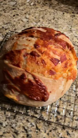 Bad bitches bake sourdough 😎 Recipe I use: • 150g active starter  • 325g filtered or spring water  (Don’t use tap or purified water) • 500g unbleached flour  • 12g salt Mix water and starter together until frothy (if your starter floats that’s means she’s active 🤗) Add in flour and salt and mix until you have a shaggy dough. Cover with towel or plastic hairnet and let dough sit for one hour. After an hour you’ll do four sets of stretch and folds every half hour. (I do coil folds for rounds 3-4) Cover and let your dough bulk ferment on the counter for 4-12 hours or until dough is jiggly like jello and doesn’t stick to your hands. This varies so much depending on the climate of your home - you’ll get to know your dough. Shape and put into a banneton or towel covered bowl and let it cold proof in the fridge for 8-24 hours (or as long as you feel like it). Preheat the oven with your Dutch oven inside to 450°. Bake covered for 35 min and uncovered for an additional 15-20 min or until golden brown. Let the bread cool for about an hour before cutting into it - then enjoy!! #sourdoughbread #sourdoughtok #sourdoughforbeginners #fyp #BakeWithMe 