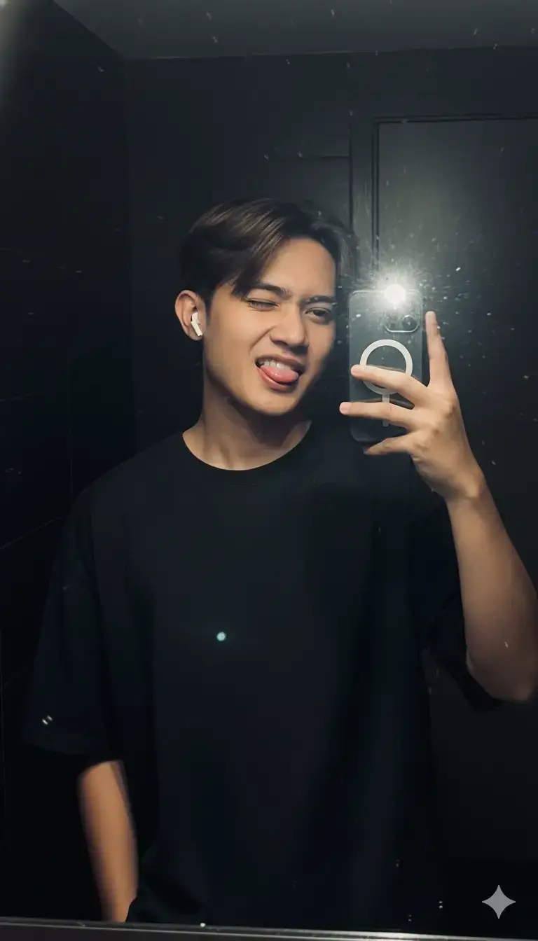prompt: Masukkan foto yang saya unggah ke dalam prompt di bawah ini, seorang pria muda sedang selfie di depan cermin di kamar mandi yang gelap, hanya diterangi oleh cahaya flash kamera, mengenakan kaos hitam longgar, memegang smartphone dengan satu tangan, rambut hitam pendek sedikit bergelombang dan ditata alami, memakai earbud nirkabel putih, ekspresi percaya diri yang halus, proporsi tubuh realistis, pantulan cahaya flash yang kuat mengenai wajah dan cermin, latar belakang gelap dengan visibilitas minimal, bayangan sinematik, pencahayaan dramatis dengan kontras tinggi, pantulan realistis dan kilauan cahaya dari flash, tekstur kulit yang detail, permukaan cermin mengilap, suasana kasual urban, fotografi ultra-realistis, resolusi 4K, menggunakan kamera DSLR profesional, lensa 50mm, bukaan f/1.8, ISO 400, rasio aspek foto 9:16, pencahayaan rendah realistis, estetika kontras tinggi. #geminiai#foto#trend#fyp#slide#aesthetic#ai#chatgpt#gemini#selfie 