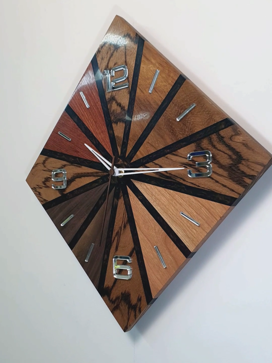 Five Woods. One Vision. 🌳✨ Nature meets design 🌿 This clock is made from five different types of wood, fused together with epoxy resin in deep, warm tones. Each grain tells its own story — together they create perfect harmony. Handcrafted in Italy 🇮🇹 Unique. Timeless. One of a kind. 👉 Discover more in my shop: gostkowskifxpart.com/collections/functional-art #FxPart #resinclock #woodandresin #epoxyresin #handmadeclock     