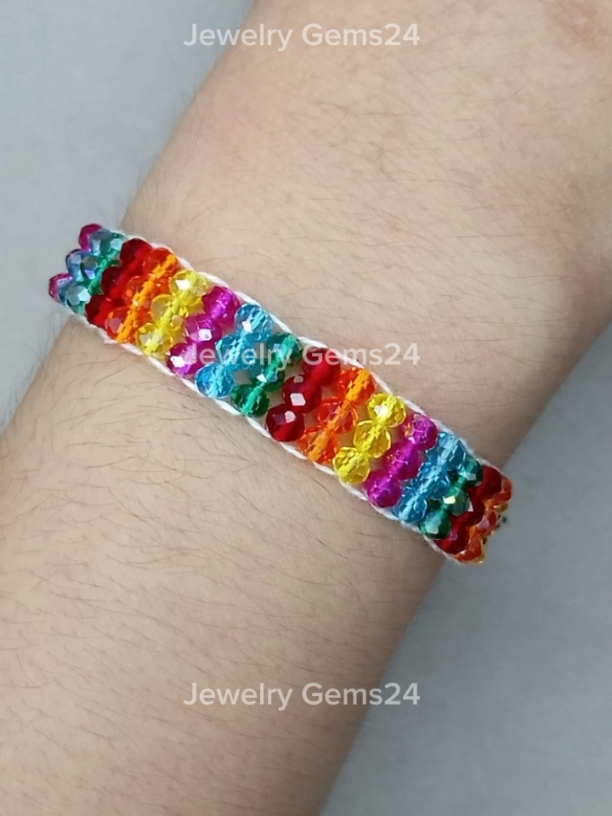 Bracelet Making #JewelryGems24 #bracelet #bracelets #foryou  Materials: 1. Gold round beads 4mm 2. Yellow crystal beads 4mm  3. Orange crystal beads 4mm  4. Red crystal beads 4mm  5. Green crystal beads 4mm  6. Blue crystal beads 4mm  7. Purple crystal beads 4mm  8. Beading needles #11 & thread  9. Clasp & scissor  👉 Thread length: 120cm