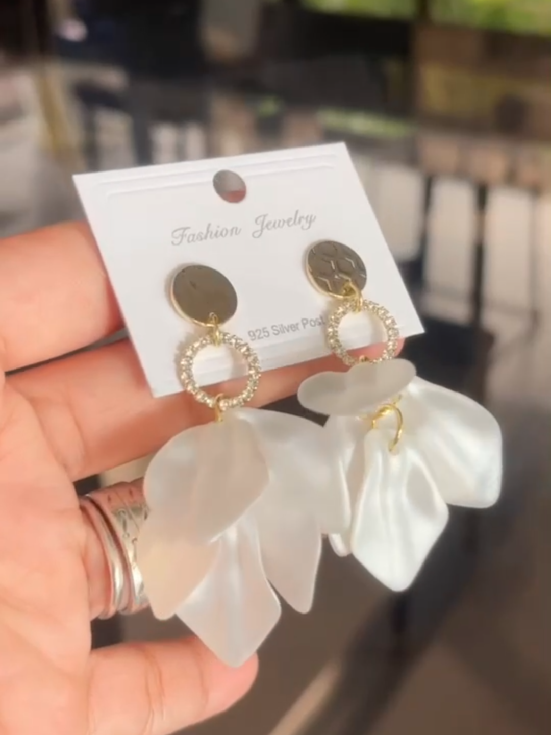 Our zircon-encrusted petal drops are a beautiful nod to vintage French elegance. #jewelry #elegantstyle #fyp #earringslovers #OOTD