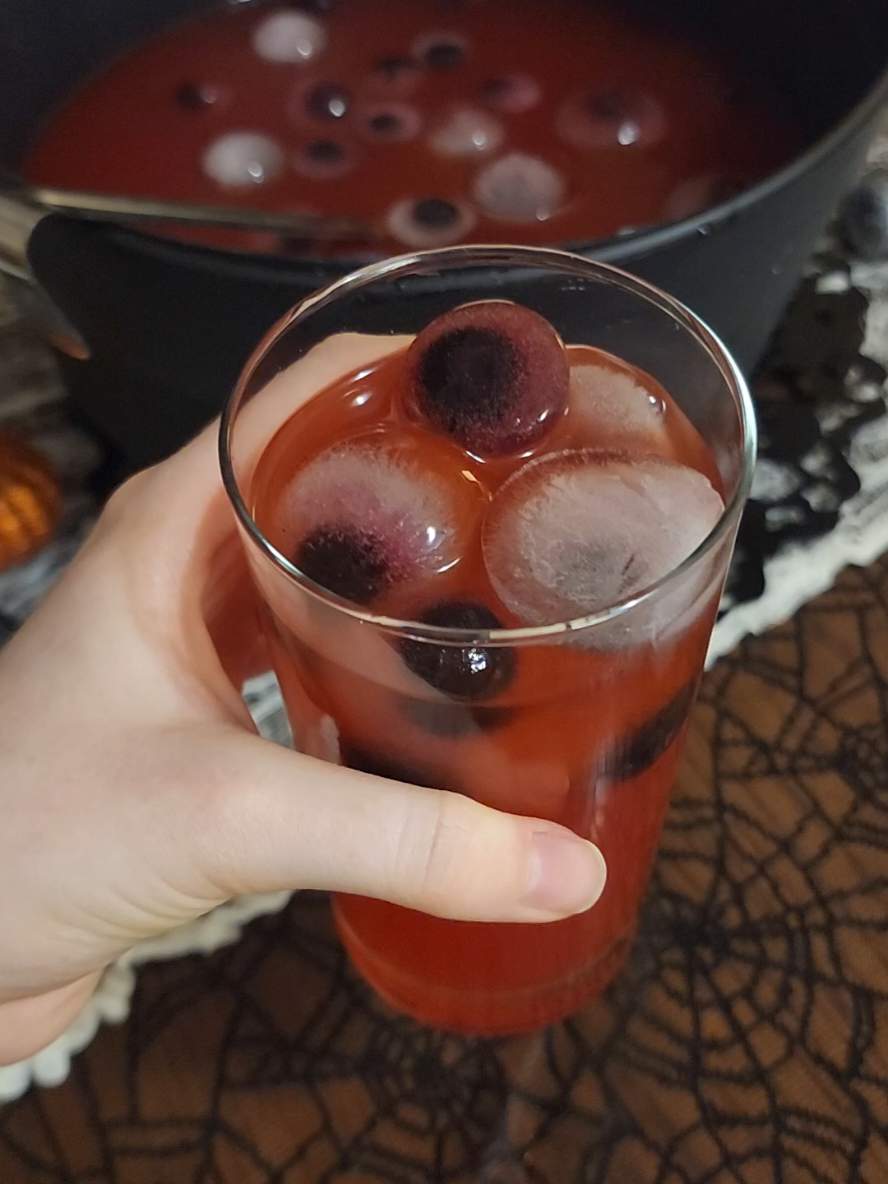 Easy eyeball punch to spook up your next halloween party. You can easily add vodka if you want too!  #halloween #EasyRecipe #witchy #drink #halloweenparty 