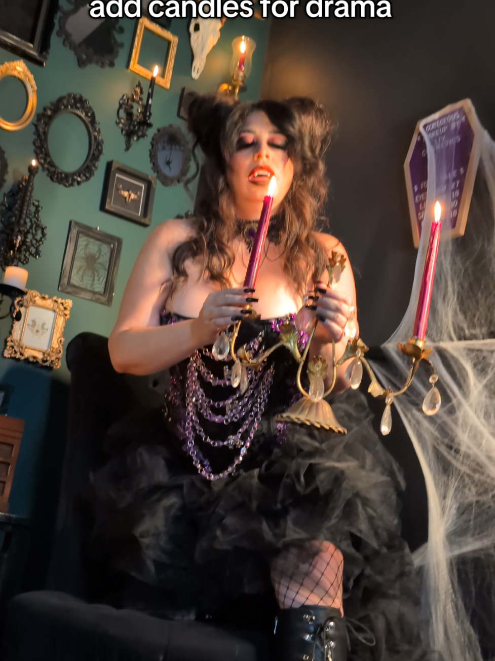 How to Make a Steam Punk Vampire Halloween Costume: You'll need: a black corset with attachment points chandelier chain rhinestone appliques E6000 stick on Fangs and a high low tule skirt #halloweencostumeidea #halloweencostume #diyhalloweencostumes #halloweenphotoshoot #fantasyphotography 