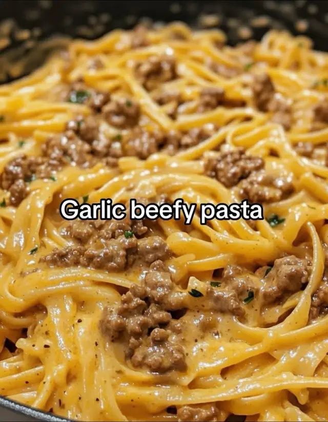 One-pot creamy beef + garlic butter pasta coming in hot—super cozy, just-right flavor, total win. Ingredients: - 1 lb ground beef - 2 tbsp butter - 4 cloves garlic, minced - 1 medium onion, finely chopped - 1 tsp dried Italian seasoning - 1/2 tsp salt - 1/4 tsp black pepper - 1/2 cup beef broth - 1 cup heavy cream - 1/2 cup grated Parmesan - 8 oz pasta (penne or spaghetti works) - Fresh chopped parsley, for garnish Directions: - Melt butter in a large pot over medium heat. - Add ground beef, break it up, and brown 5–7 min. - Stir in garlic and onion; sauté 2 min until soft and fragrant. - Add Italian seasoning, salt, and pepper. - Pour in beef broth; simmer 5 min to reduce slightly. - Add heavy cream and Parmesan; stir 3–4 min until the sauce thickens and turns creamy. - Stir in the uncooked pasta, making sure it’s submerged (add a bit more liquid if needed). - Cover and cook 8–10 min, stirring occasionally. - When pasta is tender and sauce is creamy, remove from heat, garnish with parsley, and serve hot. Prep: 10 min Cook: 20 min Total: 30 min Approx. 4 servings • ~450 kcal per serving BTW, I stash my social recipes in Ravioli AI—it lets you save recipes from TikTok (and more) all in one place, like a recipe organizer. #OnePotPasta #WeeknightDinner #CreamyPasta #GroundBeefRecipes #RecipeOrganizer