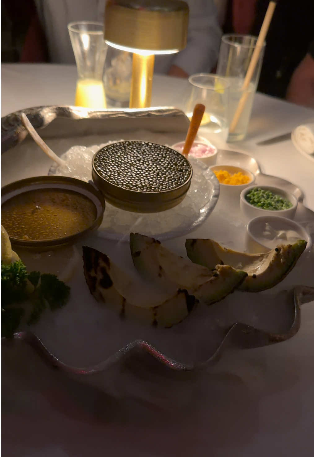 Indulging in the luxury of life 🖤🥂 Caviar dreams with a Dubai view 🌆✨Unforgettable moments, exquisite taste. #CaviarExperience #DubaiLuxury #GourmetVibes #LuxuryLifestyle #FineDining   
