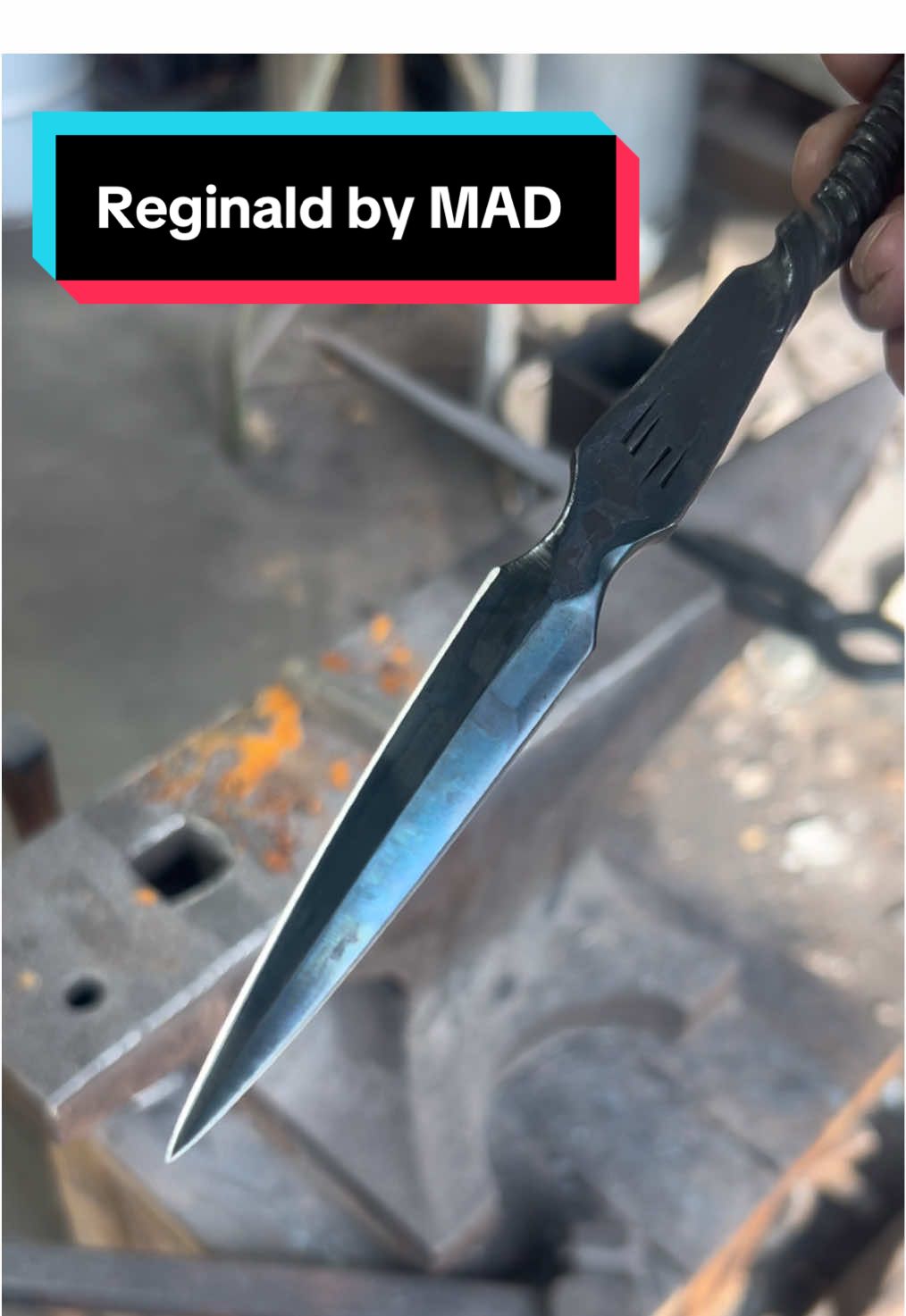 It’s called- “Reginald”. Hand forged 80crv2 with a hand made leather sheath  #madmadeblades #dagger #stilleto #bladesmith #knife 