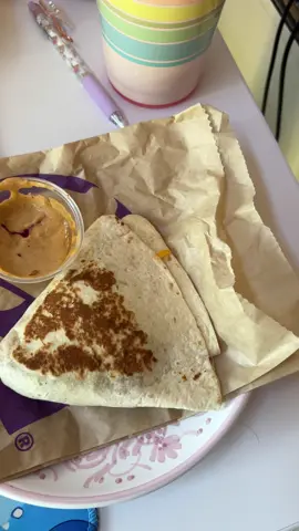 Hmm is there a wrong or right way to eat a stacker from Taco Bell? Also has anyone else switched from quesadillas to stackers- bc I have! #tacobell #snacks 