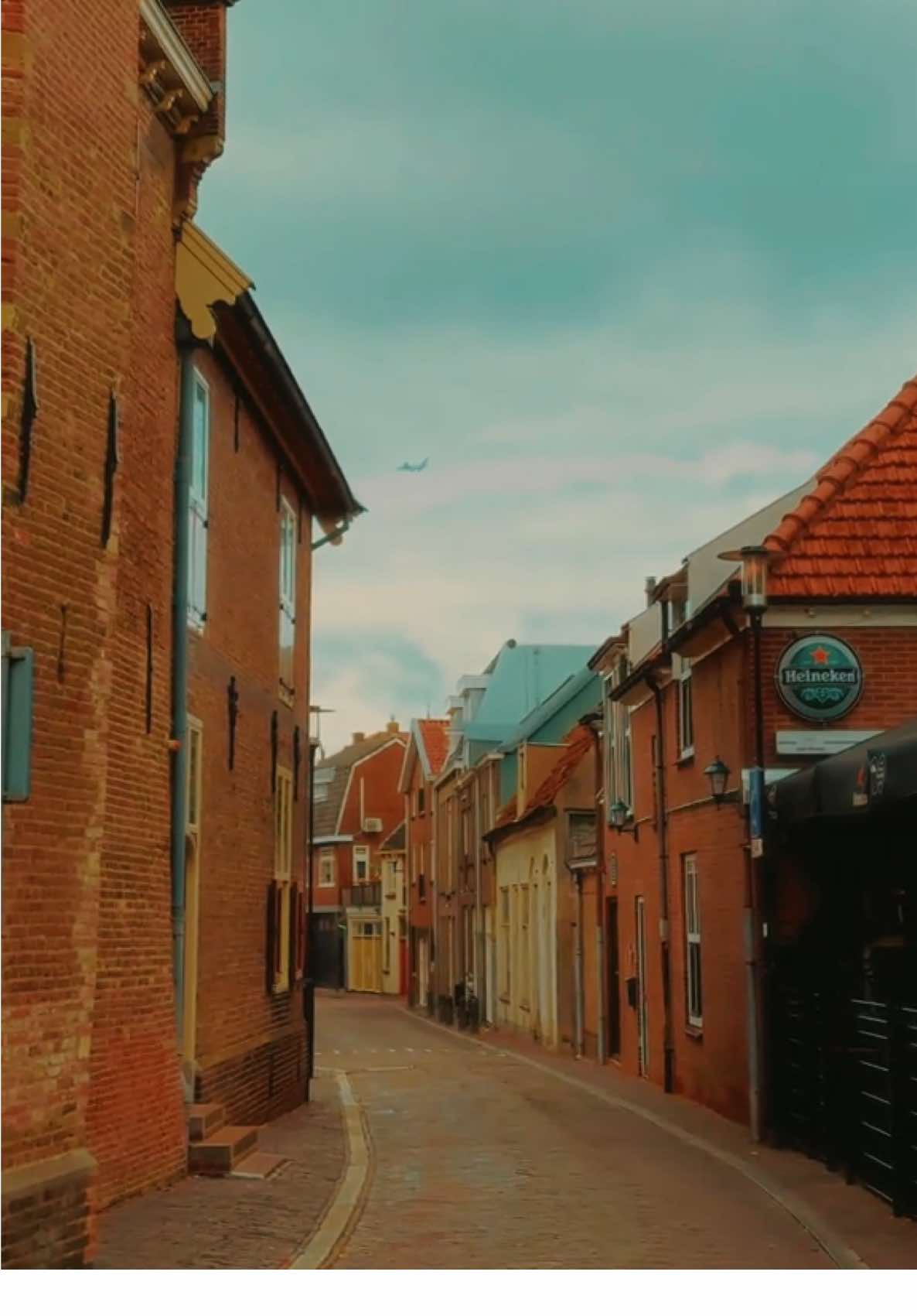 Cities you've never heard of series part 3 🤩🇳🇱 Located right between Amsterdam and Utrecht, Woerden is a small city with deep historical roots that trace back to Roman times. Once a medieval fortress town and later one of the country’s main cheese trading hubs, Woerden perfectly blends history with modern Dutch life. Its cobblestone streets, calm canals, and warm local charm make it a quiet escape from the busy cities nearby. Here, every corner tells a story — of merchants, windmills, and timeless Dutch tradition. ✨ Places to Visit: 	•	🏰 Kasteel Woerden: A 15th-century castle that now serves as a restaurant, museum, and event space. 	•	🧀 Kaasmuseum (Cheese Museum): Discover Woerden’s rich cheese-making heritage and local flavors. 	•	🚲 Singelpark & Canals: Cycle around the city’s peaceful canals and enjoy Woerden’s green surroundings. 	•	🕍 Petruskerk: A stunning Gothic-style church from the 1400s, full of history and character. 	•	🌿 Molen de Windhond: An 18th-century windmill that captures the nostalgic essence of old Holland. 🚆 Getting There: Woerden is just 35 minutes by train from Amsterdam Central Station — the perfect day trip for those who want to see the Netherlands beyond the usual. 🇳🇱 📍 Woerden /Netherlands #woerden #utrecht #dutchtiktok #netherlands🇳🇱  #autumnvibes 