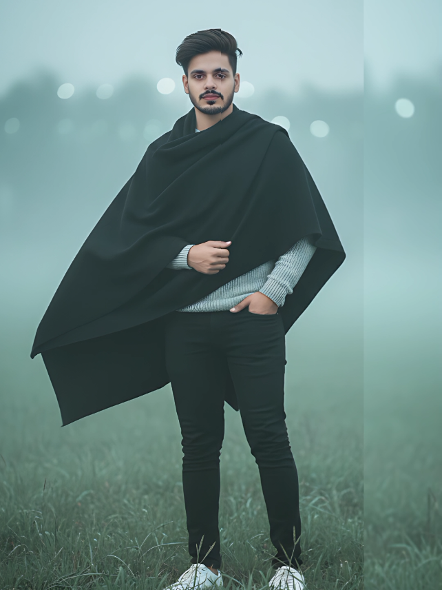 New Trending Ai image With Gemini 🤭 A full-length, cinematic portrait of a young, stylish man standing in a foggy, grassy field on a moody morning. He is draped in a black shawl or cape over a light grey sweater and black trousers. One hand is casually in his pocket, and the other is holding the edge of the shawl. The man has a confident and composed expression. The background is softly blurred with a beautiful bokeh effect and a mysterious, cool blue-green tint from the fog and environment. Captured with a low-angle DSLR shot, featuring a shallow depth of field and professional color grading. ​Detailed Description (Keywords/Details): ​Shot: Full-length portrait, Low-angle shot, Cinematic, Editorial. ​Subject: Young man, Stylish, Confident posture, Black shawl/cape, Light grey sweater, Black fitted trousers, White sneakers, Composed expression. ​Setting: Foggy morning, Misty green field, Moody atmosphere, Soft natural light, Ethereal mist, Cool blue-green color palette. ​Camera/Editing: DSLR photography, 4\text{K} resolution, Bokeh background, Shallow depth of field, High-quality color grading, Ultra-realistic detail. #foryou #gemini #tutorial #bagladesh🇧🇩tiktok #vairalvideo 