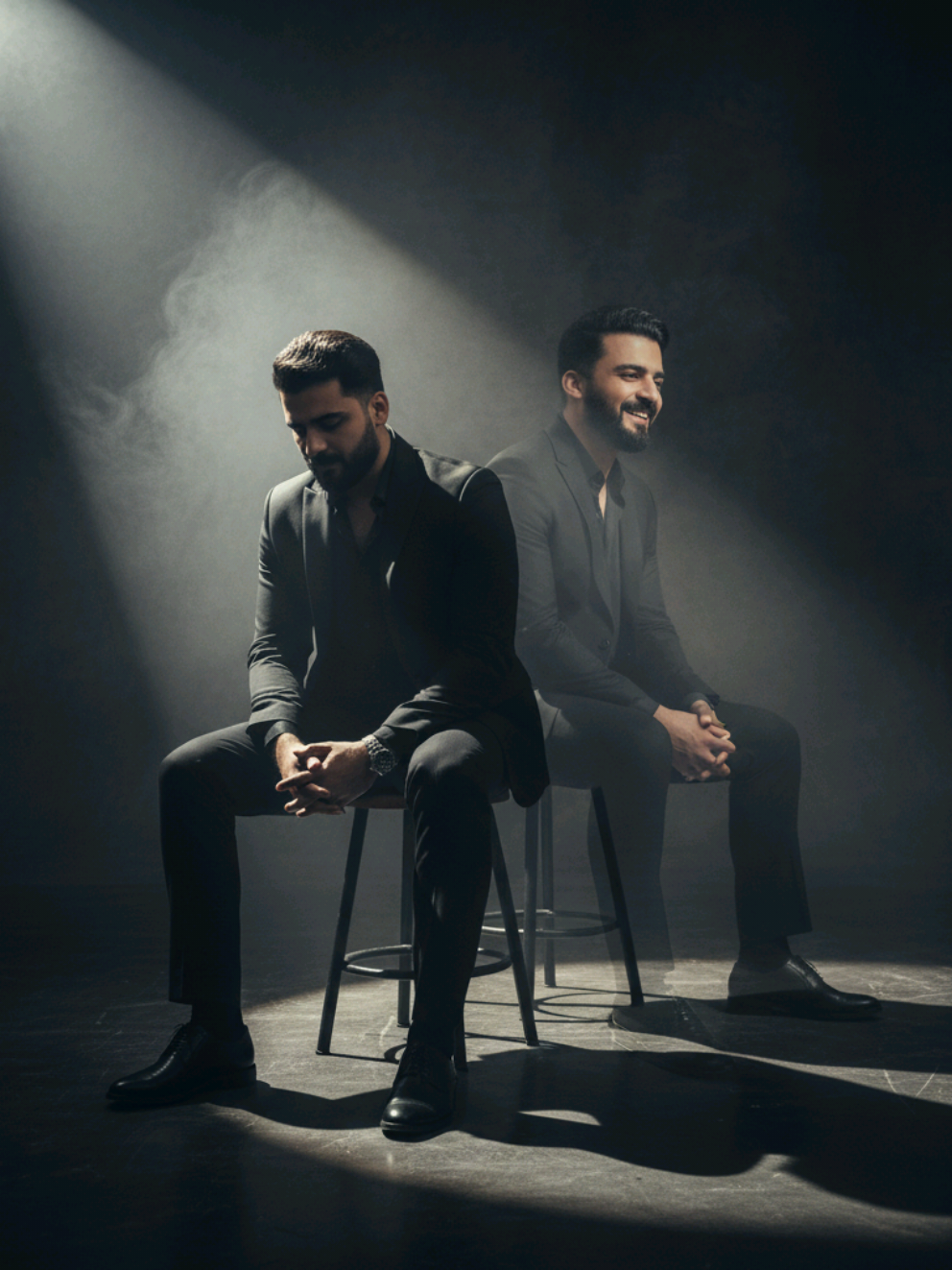 Google Gemini Ai Edit Prompt 👇🏻  Murshad Jhon Elia x Nusrat Fateh Ali Khan ❤️‍🔥🥀 Create a cinematic studio editorial double exposure portrait of me using the uploaded image. Set in a dark luxury studio with a spotlight from the top left cutting through the flowing smoke and haze. The scene features two main characters. One is sitting on a stool, lost in deep thought, he is sad. The other is a smaller version, also sitting on a stool, just behind him with a transparent overlay, 35% opacity, he is smiling and looking away. They are both wearing sharp black suits and black unbuttoned shirts, creating a bold, moody, high fashion editorial atmosphere with light rays, sharp shadows, and layered contrast in a 9:16 ratio, creating the image. #fyp #fypシ゚ #viral #chatgptprompts #googlegemini 