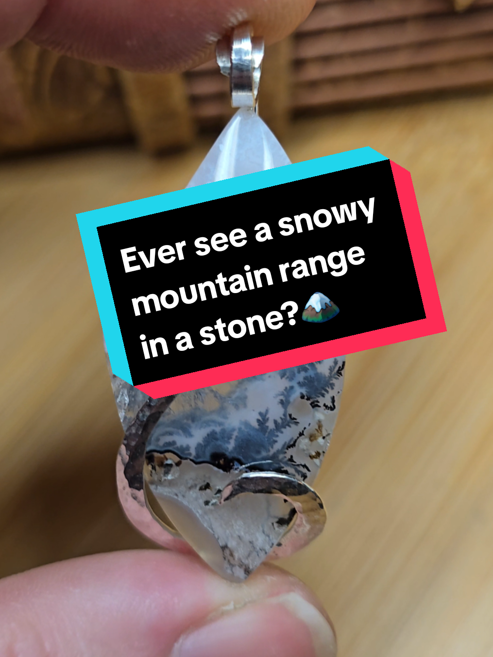 Opal, chalcedony, and quartz — a story told in layers.  The white opal clouds with a crystal sky over a chalcedony mountain range; the dark manganese dendrites branch like forest silhouettes shifting through mist, a landscape in motion, snowmelt, storm, sunrise, shadow. Every angle feels like a different season. Only one, because nature doesn’t do reruns.  Available for Adoption  #dendrite #crystal #quartz #snowday #winter 