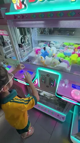 She wasn't going to let the weak claw win. 😤 When the machine plays games, you've gotta resort to alternative methods. 😂 That toy was hers! 🏆  The hustle is real. #ClawMachine #Arcade #KidsAreFunny #Hustle #VVHDaily