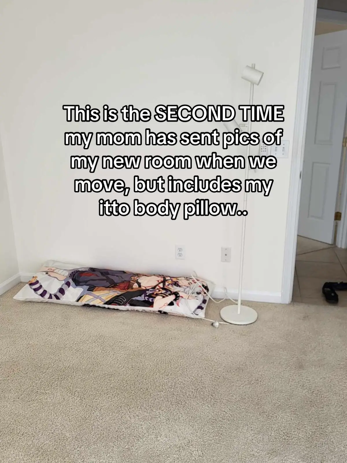 I highkey think in the first one she’s just using it as a way to mark where my bed is gonna be but why him😭😭 Disclaimer he was PACKED INTO A BOX WITH MY OTHER PLUSHIES, so she had to deliberately take him out for this #genshin #GenshinImpact #genshinimpact33 #itto #bodypillow 