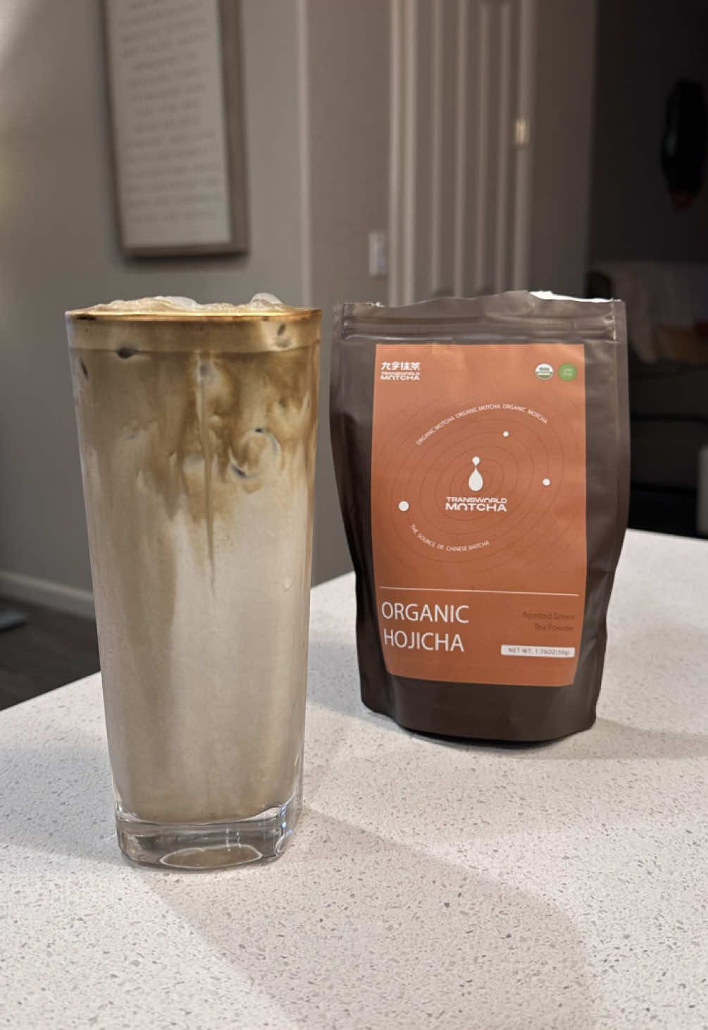 Hojicha Latte •.• I have been looking for a good Hojicha but the good ones that I heard about aren’t available right now sooo I’ll just be trying out different ones until they’re available again. This one is from Amazon. It’s pretty affordable and arrived fast. It gives off a warm roasted aroma. It’s also smooth and mellow on the tounge, not grassy. None of that “seaweed” flavor so it’s approachable. Let me know what I should try next! 🤎 #fyp #icedlatte #hojicha #drinktok #homecafe 