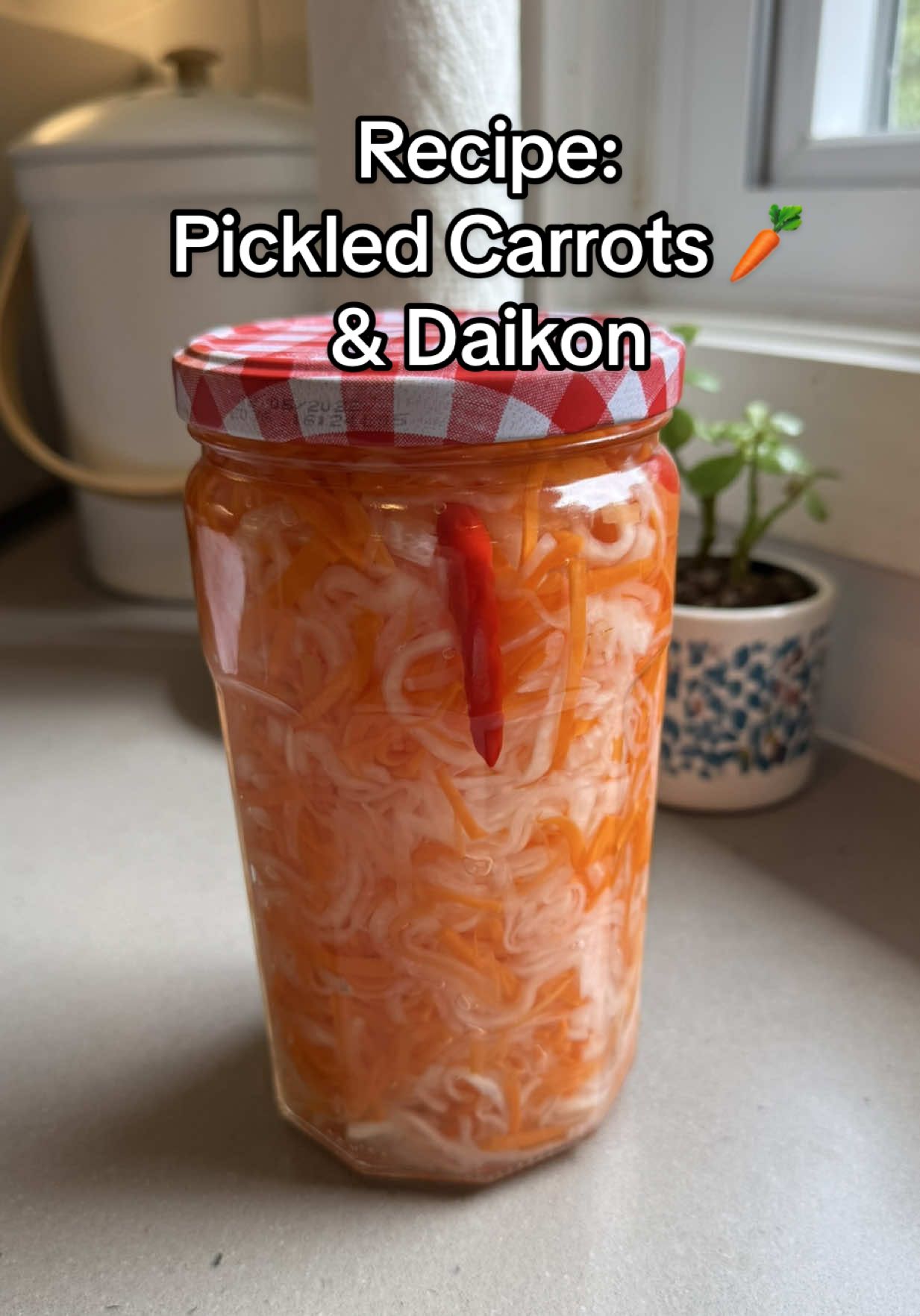 Replying to @SHR Save my recipe for a quick and easy pickled carrots and daikon 🥕 * 2 medium carrots, (about 2 cups) thinly sliced or shredded  * 1 small daikon, (about 2 cups) thinly sliced or shredded  * 2-3 tablespoons kosher salt  * 1-2 Thai chilies, optional  * 1 1/2 cup water  * 1 cup white vinegar  * 1/2 cup sugar  * 1/2 tbsp kosher salt 1. Peel carrots and daikon then slice into matchstick strips or shred with a mandolin. Sprinkle with 2-3 tbsp salt and mix well. Leave it for 10-20 mins to draw out excess moisture. Rinse well with water and strain well. Squeeze out excess water if needed.  2. In a medium saucepan, bring water to a boil, then add sugar and salt. Stir until everything has dissolved.  3. Turn off heat then pour vinegar and mix well. Leave to cool to the touch.  4. Add strained carrots, daikon and chilies (optional) into glass storage container. Pour the cooled brine into the container. Cover and store in the fridge to marinate 4-6 hours or overnight for best results. Enjoy!  #pickledveggies #pickles #EasyRecipe #Recipe 