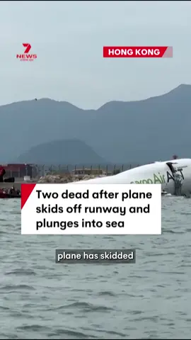 Two people have died after a cargo plane skidded off the runway and into the sea at Hong Kong International Airport. The Emirates SkyCargo flight EK9788 was arriving from Dubai when it collided with a ground patrol vehicle halfway through its landing about 3.53am local time (6.53am AEDT) on Monday, according to local media reports. #plane #airport #HongKong #cargoplane