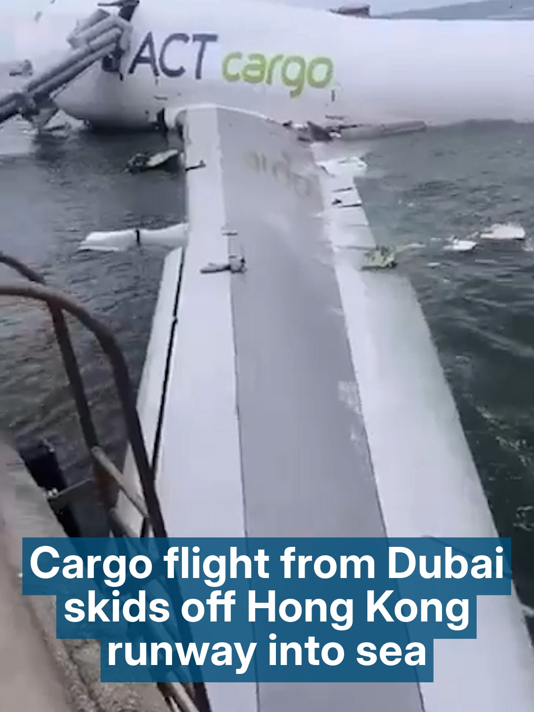 Two people were killed after a cargo aircraft operated for Emirates airline skidded off the runway and into the sea while landing in Hong Kong.
