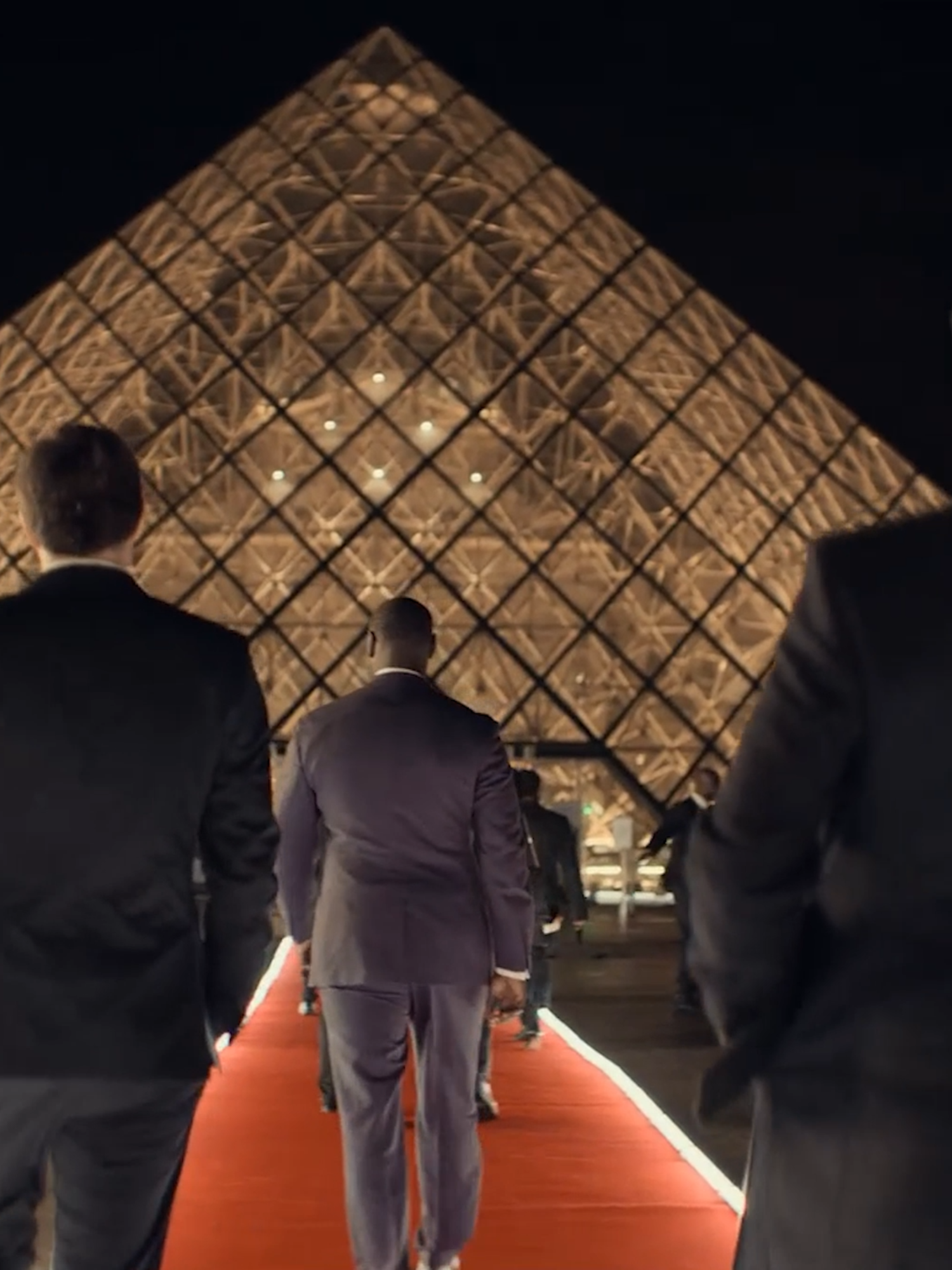 They really pulled a Lupin in real life. Yesterday morning, four thieves executed a seven-minute heist at the Louvre in Paris, stealing eight pieces of priceless jewelry from Napoleon's collection . They showed up with a furniture elevator on a truck, extended a ladder to a second-floor window, smashed it with an angle grinder, broke two display cases, and escaped on motorcycles. The stolen items include a tiara, necklace, and earrings once worn by French empresses Marie-Louise and Eugénie. One piece, the crown of Empress Eugénie (featuring 1,354 diamonds and 56 emeralds), was dropped during the escape and recovered damaged. French authorities are calling it 