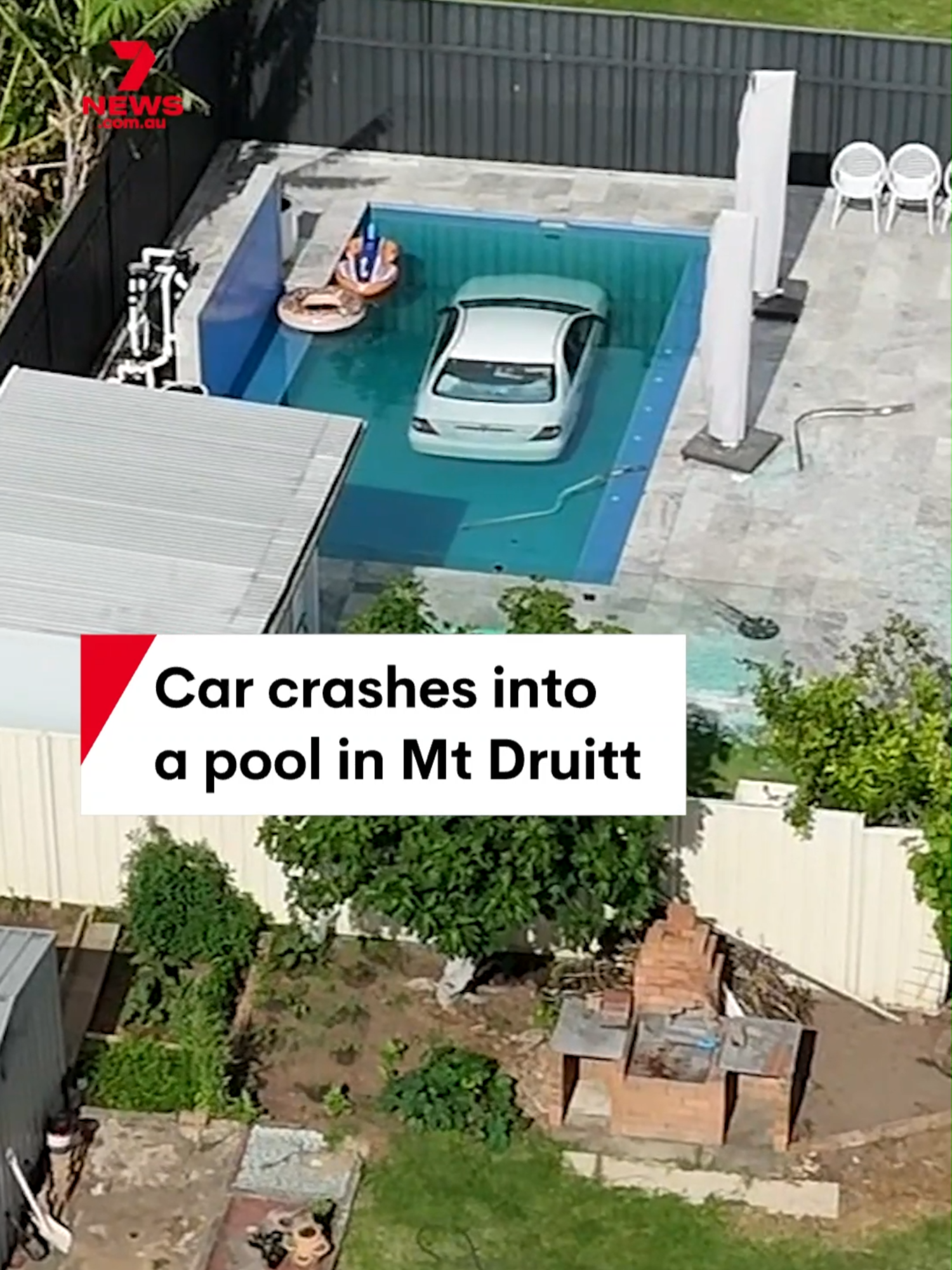 An elderly driver lost control of their vehicle at Mount Druitt, crashing through a residential fence and directly into a family's backyard swimming pool. The homeowner rescued the driver from the pool, cutting his feet on broken glass in the process, and the elderly man was taken to hospital. #MtDruitt #carinpool #carcrash
