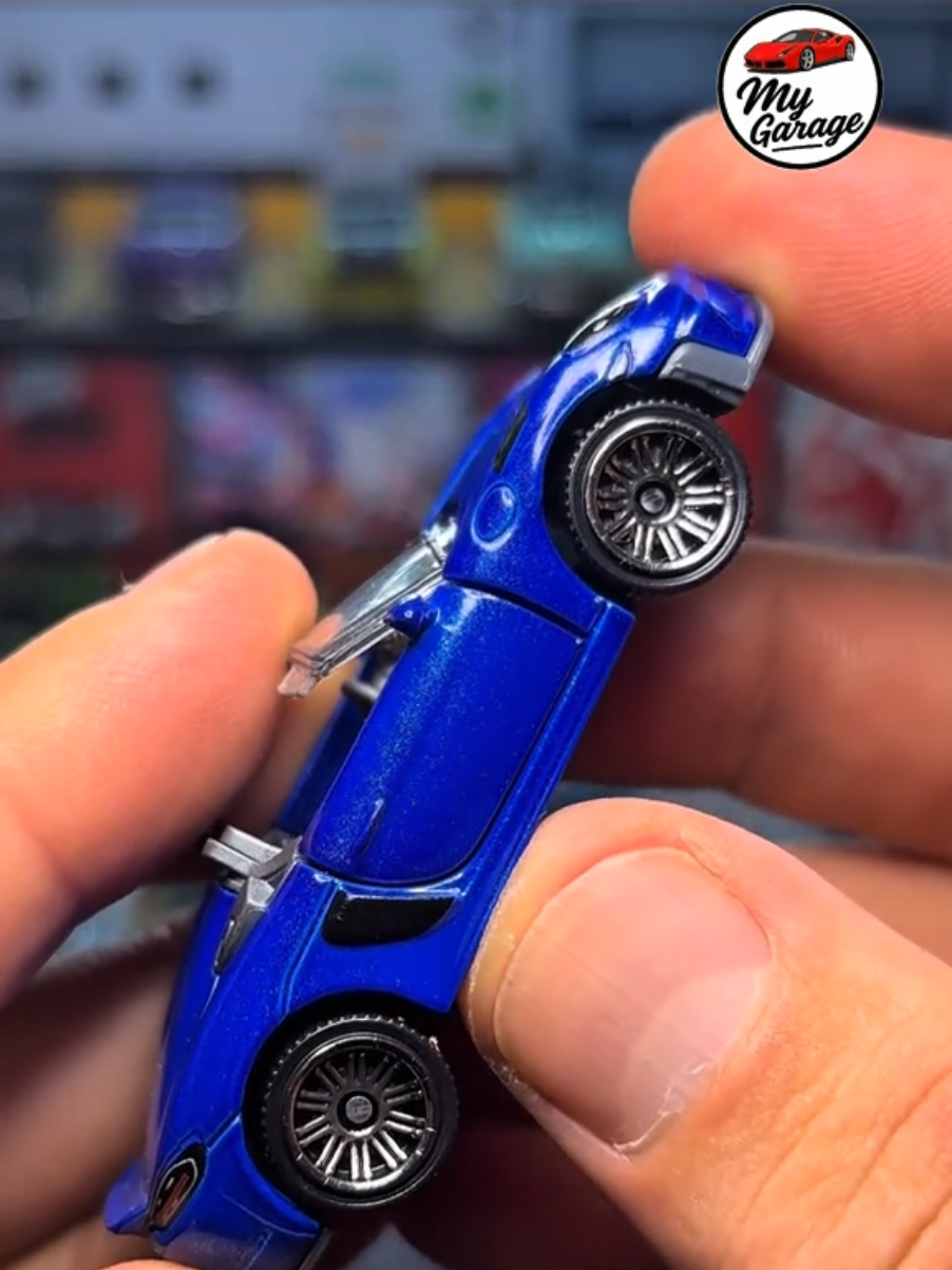Matchbox Moving Parts 2024 Porsche 918 Spyder RS Unboxing | 1:64 Diecast Car Unbox the Matchbox Moving Parts 2024 Porsche 918 Spyder RS 1:64 scale model, a miniature version of one of the most advanced hybrid hypercars ever built! The real Porsche 918 Spyder was introduced in 2013 as part of Porsche’s cutting-edge performance lineup, featuring a 4.6-liter V8 engine paired with two electric motors to produce a combined 887 horsepower. It accelerates from 0–100 km/h in just 2.6 seconds and reaches a top speed of 345 km/h (214 mph).   This Matchbox Moving Parts model captures the sleek design and performance spirit of the 918 Spyder, featuring opening elements, precise body lines, and authentic detailing that showcase the car’s innovation and engineering excellence.  A must-have for any diecast collector or Porsche enthusiast!   Like, comment, and subscribe for more model car unboxings!   Model: 2024 Porsche 918 Spyder RS  Brand: Matchbox Moving Parts  Scale: 1:64  Category: German Sport Cars / Diecast Collectibles  Colour: Blue   #minigt #hotwheels #hotwheelspremium #Porsche918Spyder #MovingParts
