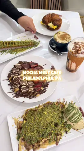 Philly, your new halal dessert obsession has officially arrived! 🍨🔥 @Mocha Melt Cafe just opened its doors — serving up next-level desserts & savories you don’t want to miss. 📍124 Market St, Philadelphia, PA 19106 What we had: 	•	Dubai Fettuccine Crepe (Coming soon 👀) 	•	Nutella/Strawberry/Banana Bubble Waffle 	•	Pistachio Stick Waffle 	•	Pistachio Affogato Latte 	•	Oreo & Lotus Shake 	•	Egg & Sausage Croissant #halal #desserts #philly #halalfood #new 