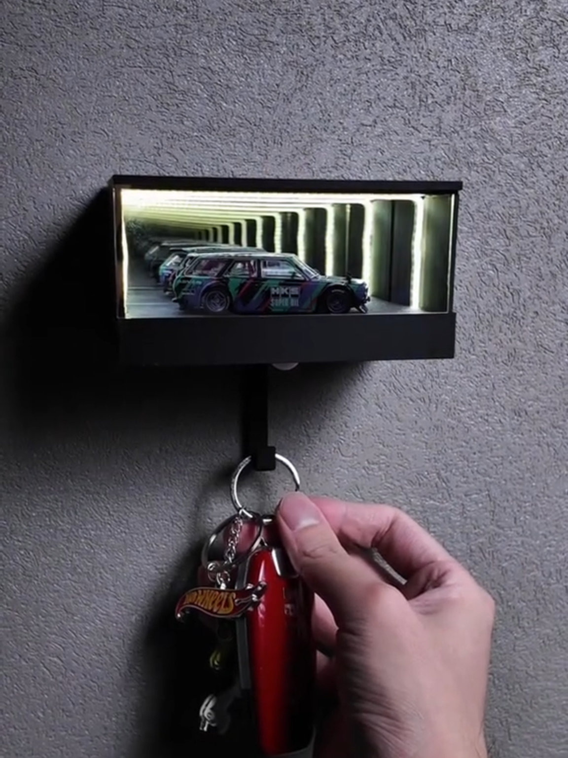 🚗✨ Park Your Keys in Style! 🔑💡 Meet the Infinity Garage Keychain Holder — where design meets innovation! Featuring a mesmerizing 3D light illusion and a sleek car display, it’s the perfect gift for car lovers and home decor enthusiasts alike. 🏎️ Unique “infinite tunnel” LED effect 🔑 Practical key holder meets modern art 🎁 Ideal for car enthusiasts or holiday gifting 🌟 Adds a stylish glow to any entryway or garage 👉 Turn your everyday key drop into a show-stopping moment!