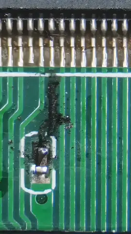 #Nublê Repairing burnt-out motherboard traces with fly wires.