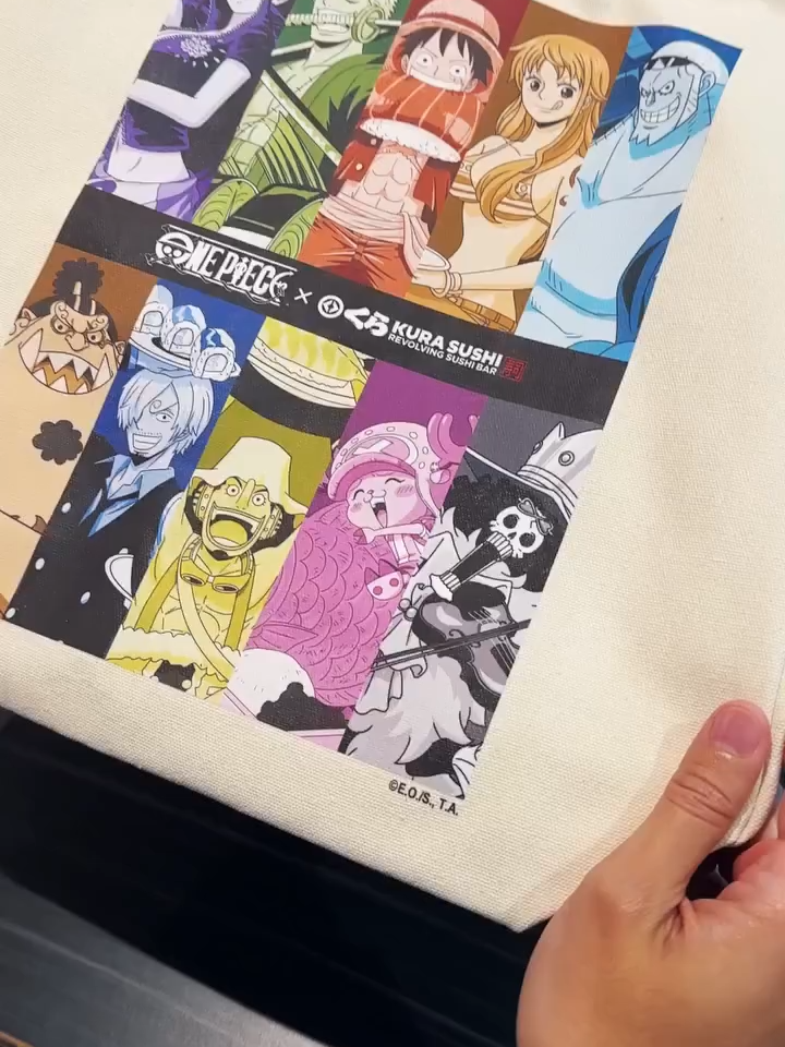 🏴‍☠️ Bag down. Lanyard on. Chopsticks out. Sushi devoured. Your ONE PIECE adventure starts at Kura Revolving Sushi Bar 🍣✨ 👜 Tote Bag – spend $85 (Rewards members) starting Oct. 22 while supplies last 👉 Start your One Piece adventure here: https://kurasushi.com/onepiece-bikkura-pon-collaboration-2 #conveyorbeltsushi #revolvingsushi #kurasushiusa #onepiece #luffy