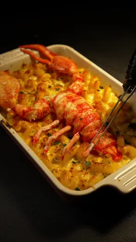 Lobster Mac & Cheese. I remember being completely fascinated the first time I saw Gordon Ramsay deshell a whole lobster down to its legs. Every time I think about lobster, I go right back to that moment of awe. This dish was inspired by that memory, so thank you Gordon. To start, I quickly put the live lobster out, then dropped it into boiling water for a few minutes before shocking it in an ice bath to stop the cooking. I separated each part and carefully deshelled them, trying to keep every piece whole. For the mac and cheese, I began by making a lobster broth. I sautéed the shells with shallots, garlic, thyme, and a bit of tomato paste, then poured in chicken stock and let it simmer for 30 to 45 minutes until it turned into a rich, fragrant lobster broth. Once strained, I made lobster butter using a few spoonfuls of the broth whisked with butter, shichimi togarashi for a spicy kick, and a squeeze of lemon. I set that aside for later. I used the remaining broth as a base for the cheese sauce, mixing heavy cream, half and half, and black pepper. I grated cheddar, parmesan, and fontina and stirred until melted. Normally I would blend the sauce for a silky finish, but I skipped that this time. Big mistake, don’t skip that step. I folded in al dente cavatappi, keeping it a little on the saucy side since it thickens up after baking. Into a dish it went, topped with more parmesan, then under the broiler until golden brown.   Finally, I assembled the lobster on top, brushed it with the lobster butter, then put the head shell to give it that wow factor. It tasted incredible and looked unreal, but I found a few things I’d improve. The lobster flavor didn’t shine as much as I wanted. Next time I’d throw in prawn heads for a deeper broth, use more stock and less milk, swap out the cheddar for a milder cheese, blend the sauce until smooth, and finish with browned panko crumbs. I actually added the panko crumbs after filming and it instantly leveled it up. With those tweaks, this would be perfect.