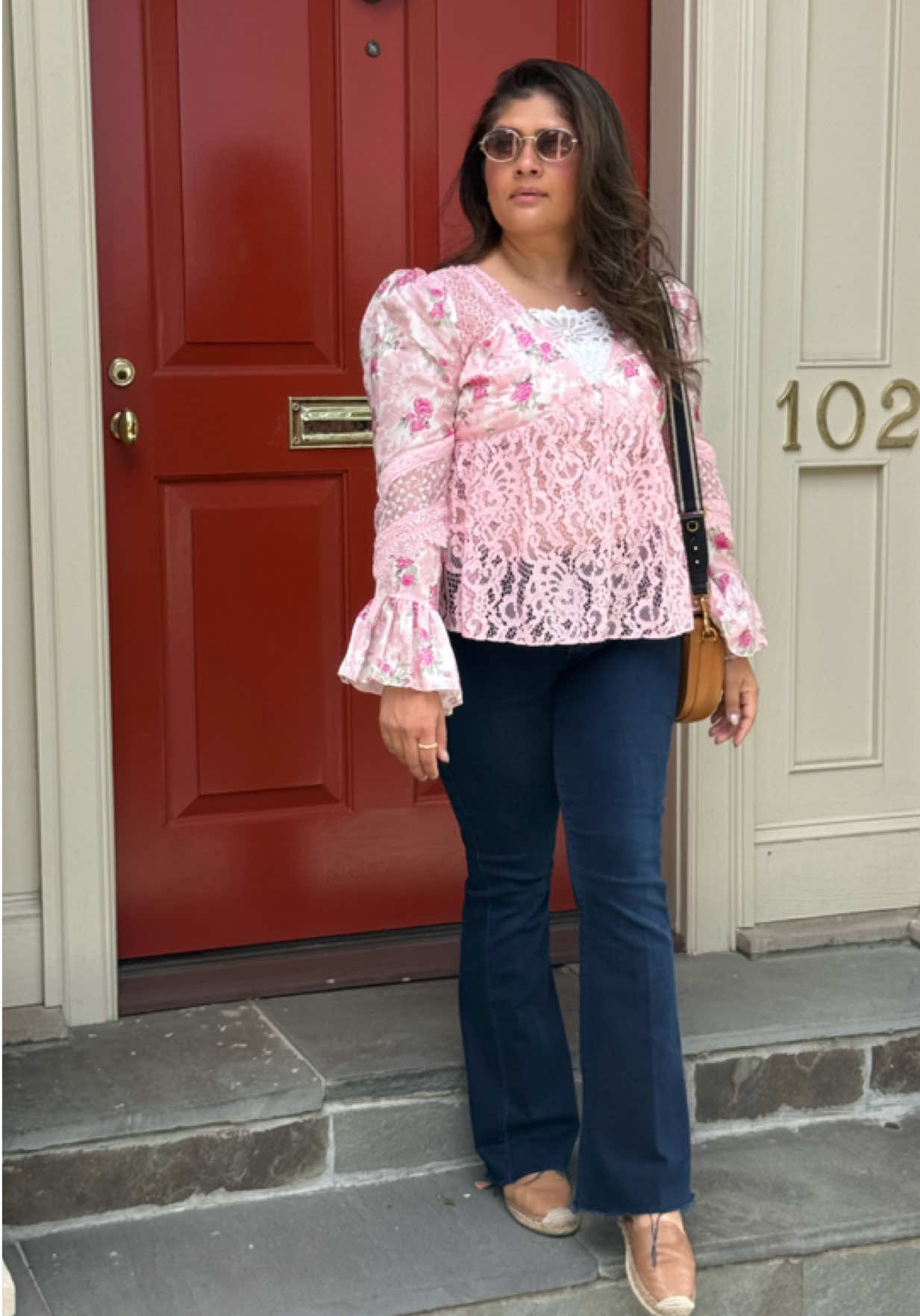 Exploring Charleston in full rom-vibe ✨ Styling my fall outfit to match the city’s charm, a floral bell-sleeve top by @LoveShackFancy , flared jeans, and flat espadrilles (because it’s a walkable town and comfort is key!). The perfect finishing touch: my Dior Bobby bag a chic nod to heritage (did you know it’s named after Christian Dior’s beloved pup, Bobby?). Keeping this outfit of the day romantic, effortless, and totally me.  My Must Dos In No Particular Order: 1. Joe Riley Waterfront Park (Pineapple fountain - located downtown) 2. Charleston City Market (downtown) 3. Rainbow Row (downtown) 4. Walk along King Street (Main Street downtown) 5. Old Carriage Company Horse drawn Carriage Rides 6. Millers all day for brunch/lunch 7. Sorelle Fine Dining  8. Fig For Fine Dining  9. Carmella’s Cafe & Dessert Bar 10. Middleton Plantation & Gardens - Beautiful grounds - focus was on the history and acknowledgement of the slaves that built it.  #falloutfit #loveshackfancy #lacetop #styleover40 #charlestonsc   
