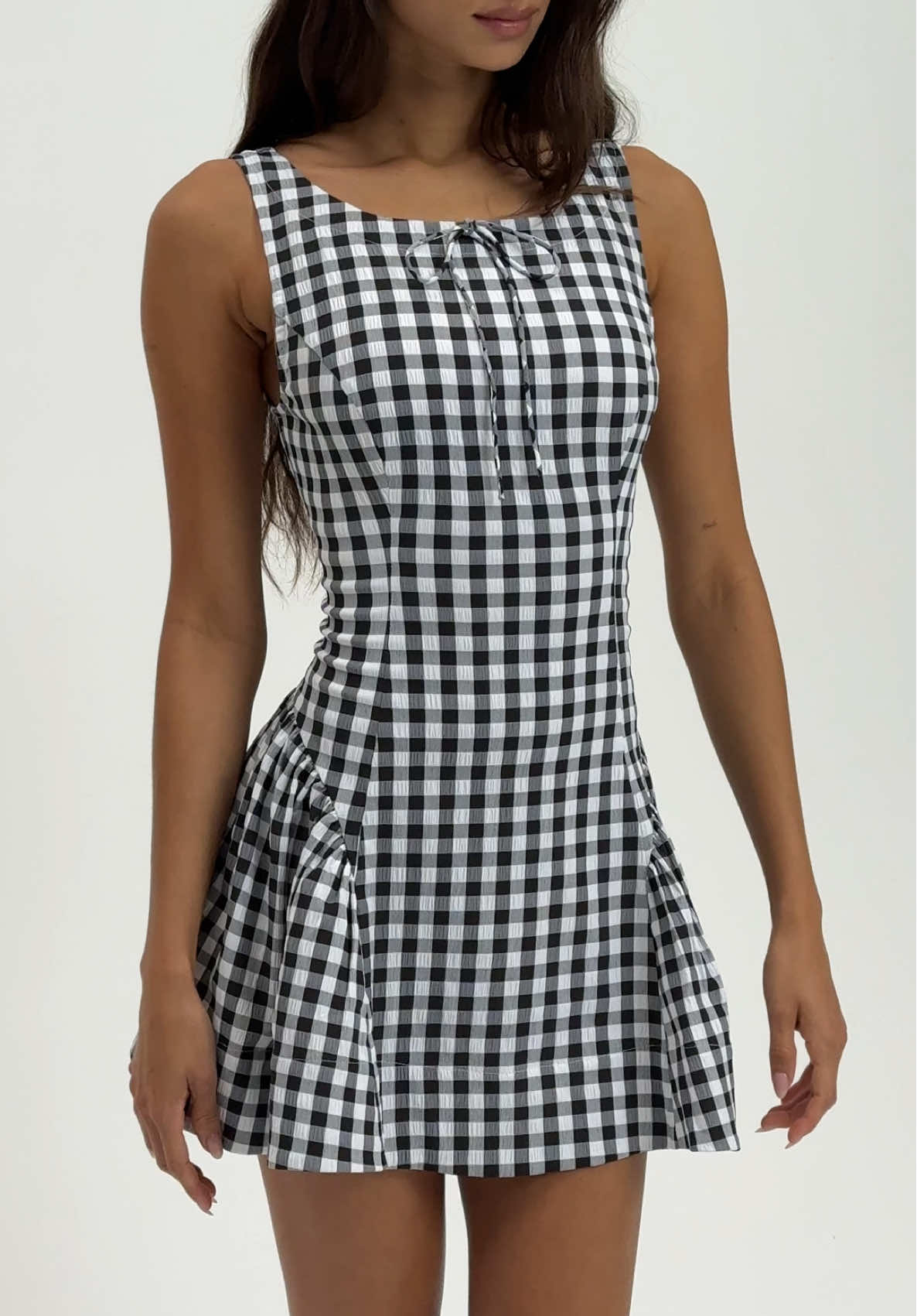 your favorite mini, now in black gingham 🤍 the scotch bonnet gingham mini dress 