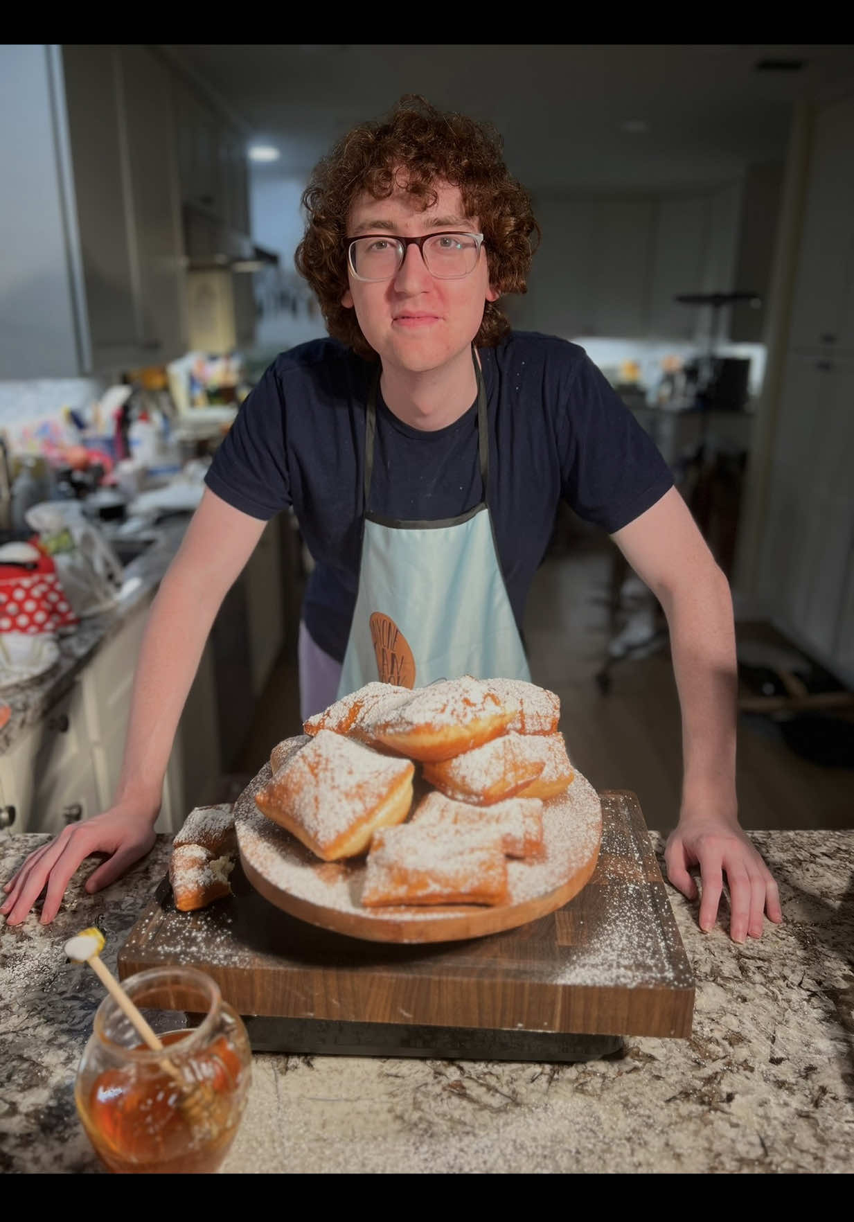 Easy Beignets from Princess and the frog!! Better than Cafe Du Monde, try  for yourself!! Ingredients: 4 Tsp dry yeast 2 and half TBSP sugar 1/2 tsp baking soda Salt 1 and half cups butter milk Half cup boiling milk 624 grams bread flour/ 4 cups Honey if you want to add it!! 1. Activate Yeast: Mix buttermilk and boiling milk with sugar and dry yeast. Stir and let sit for 10 minutes. 2. Make Dough: In a stand mixer, combine bread flour, baking soda, and kosher salt. Add the milk mixture and mix with a dough hook for 3-4 minutes until sticky. 3. Rest Dough: Transfer to a greased bowl, cover, and let rise for 1 hour. 4. Shape: Generously flour the dough, roll to ¼-inch thick, trim edges, and cut into rectangles. 5. Fry: Heat oil to 370°F. Fry 3-5 pieces at a time, basting the tops for 2 minutes before flipping. Cook until golden. 6. Finish: Drain on paper towels. Dust with powdered sugar—or drizzle with honey first for a Princess and the Frog twist! #princessandthefrog #beignets #neworleans                