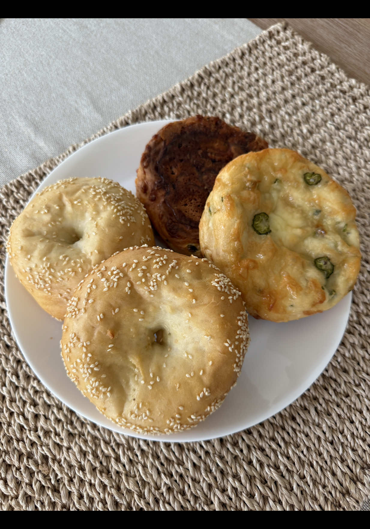 The jalapeño cheddar were our fav and the sesame were the fluffiest! The other two are a no for me lol. I’ll have to retest with other flours and yogurts it’s probably a me thing!  Cottage cheese bagel recipe: - 2 1/4c AP flour 282g - 2c cottage cheese 453g - 4tsp baking powder 16g - 1 egg for egg wash For mix ins I did half the dough with: - 1/4 c cheddar + 2tbsp for topping 50g - 1/2 jalapeño + a few slices for topping  The other I just sprinkled the top with sesame seeds.  Bake at 350 for 30-35 minutes until golden brown.  #cottagecheese #cottagecheeserecipe #bagel #highprotein 