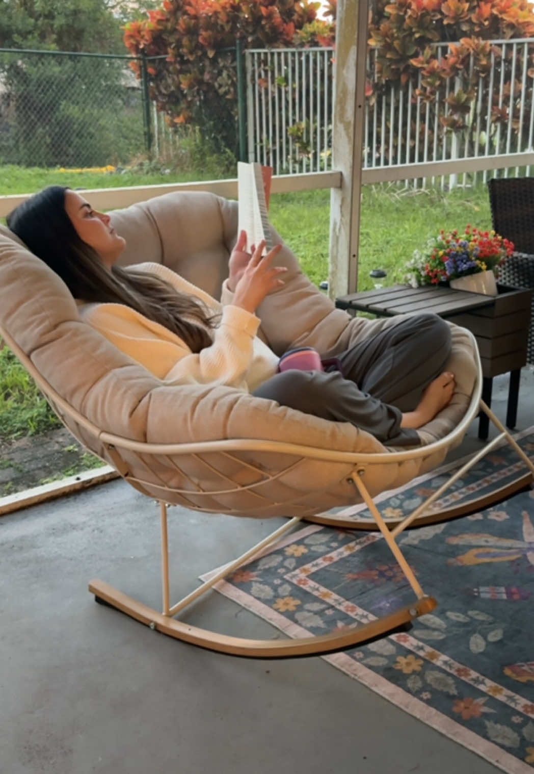 sitting in this oversized rocking chair feels like getting swallowed by a cloud & the rainy weather makes it even cozier 😌⛈️ Today only it’s on sale too - tap the orange cart above my name to grab the deal.  #rockingchair #outdoorrockingchair ##tiktokshopcreatorpicks #tiktokshopblackfriday #tiktokshopcybermonday  