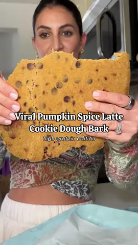 VIRAL PUMPKIN SPICE COOKIE DOUGH BARK (high protein)  Ingredients * 1 cup almond flour * 1 scoop @ShopFlavCity Pumpkin Spice Latte Protein Mix * ¼ cup coconut oil, melted * ¼ cup pure maple syrup * ½ tsp pumpkin pie spice * Pinch of salt * 1/4 cup chocolate chips Chocolate topping * ½ cup dark chocolate chips * 1 teaspoon coconut oil Directions 1. In a bowl, mix almond flour, Flavcity Pumpkin Spice Latte Protein Mix, coconut oil, maple syrup, pumpkin pie spice and salt until the dough forms. 2. Fold in chocolate chips gently. 3. Press the dough onto a parchment-lined baking sheet to create an even slab. 4. Melt extra chocolate chips with coconut oil either over double boiler or a microwave in 20 second increments. 5. Once it’s melted, pour it over the slab, and smooth out. 6. Freeze for at least 30 minutes, then break into bark pieces. 7. Store in the fridge or freezer! #highproteinrecipes #highproteindessert #proteindessert #proteinsnacks 