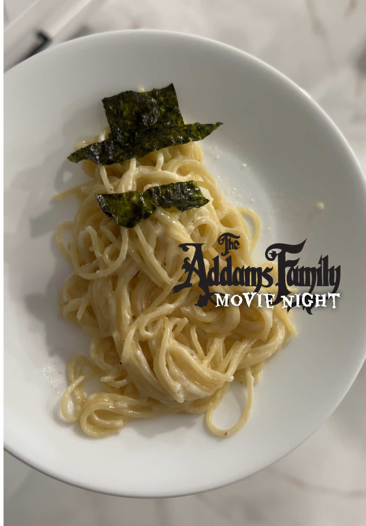 Family game night, but make it Addams. 💀🕷🖤 Pass the popcorn, Thing! #addamsfamily #movienight #halloween #spookyseason #wednesdayaddams 