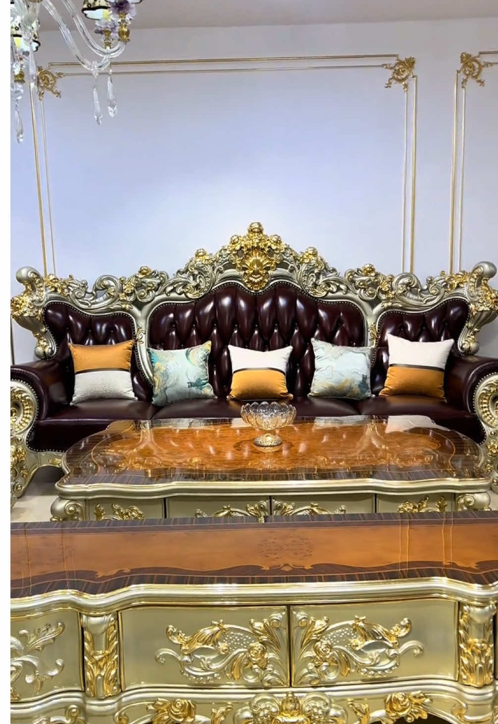Crafted from luxurious champagne gold and 24K gold, paired with elegant burgundy leather, this exquisite sofa is truly worthy of your ownership.#furniturefactory #SofaSet #EuropeanFurniture #LuxuryFurniture #FurnitureAesthetics 