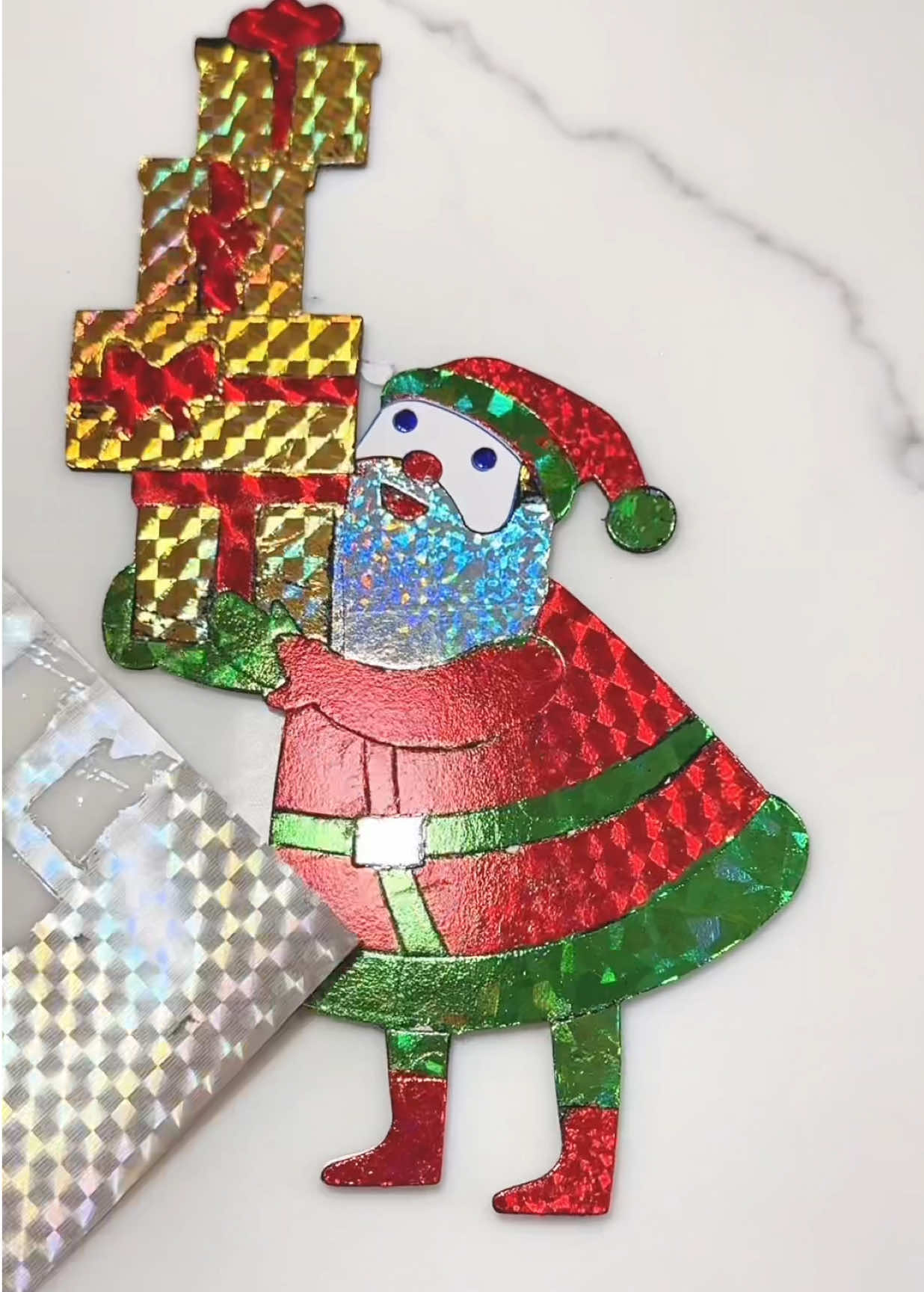 This Holiday Magic Fool Fun sticker kit is so much fun and so easy to use. You get over 100 stickers, 100 foil sheets plus scenes you can decorate. Get it for your kids but you will be obsessed. Such a fun Christmas craft. #christmas #stickers #kidscraft #foilfun #holidays