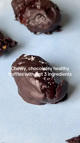 Dark chocolate peanut butter truffles 🍫 Not all recipes have to be complicated, and these dark chocolate covered dates stuffed with peanut butter and topped with salt are pure chewy, chocolatey, healthy bliss ✨ The easiest dessert you’ll ever make - no refined sugar, just sweet, salty goodness!  Ingredients (makes 8–10): 	• Medjool dates, pitted 	• natural peanut butter 	• 85% dark chocolate (or your fave) 	• Flaky sea salt, for topping Method: 	1. Slice each date open lengthwise and remove the pit. 	2. Fill each date with about ½ teaspoon of peanut butter — don’t overfill or it’ll leak out! 	3. Melt dark chocolate in the microwave or over a double boiler until smooth. 	4. Dip each stuffed date in melted chocolate using a fork, then place on a baking sheet lined with parchment paper. 	5. Sprinkle with flaky salt while still wet. 	6. Chill in the fridge for 15–20 minutes until set. 	7. Store in the fridge or freezer (fridge for a chewier treat). #healthydessert #viral #Recipe #dates #healthy 