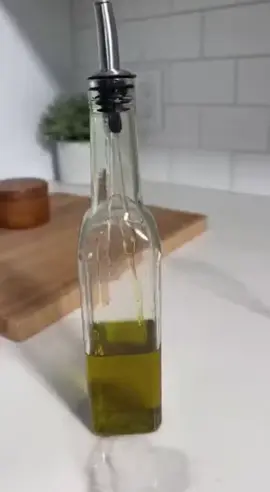 The Olive Oil Bottle Hack You'll Wish You Knew Every time you pour olive oil and it drips down the bottle... this one simple trick fixes it completely. No gadgets, no mess - just pure kitchen satisfaction. Try it once, you'll never go back. #KitchenHack #LifeHacks #HomeTips #SmartLiving #DIYHack