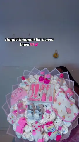 Made this diaper bouquet for my client a few months ago, to welcome a baby girl🎀💞                —————————————- Need a beautifully made bouquet or gift box? We have different beautiful gift options at very affordable prices,  Send a DM 💕 —————————————— #suprisepackage #surpriseplug #diaperbouquet #trendingbouquet #surprisepluginekpoma 