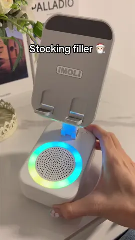 Wireless speaker phone stand and even charges your phone good idea for a stocking filler #wirelessspeaker #stockingfiller #tiktokmademebuyit 
