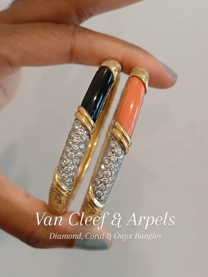 Van Cleef & Arpels 💎✨️ A pair of diamond, onyx and coral bangles. DM for more details. #morelledavidson #prelovedluxury #finejewellery #highjewellery #vintage #antique #jewellerycollector #onyxbangle #coralbangle #diamonds