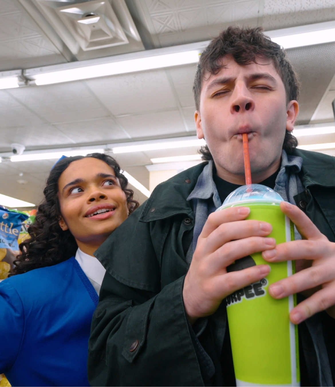 He’s got a Slurpee, a smirk, and a story. 🥶 Watch Casey Likes and Lorna Courtney light up the screen in the Freeze Your Brain music video. #Heathers #HeathersTheMusical